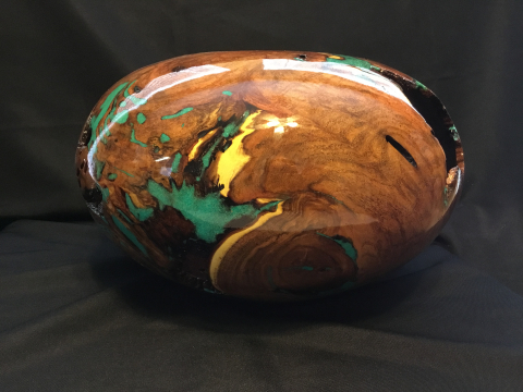A Mesquite Burl With Turquoise Inlay
