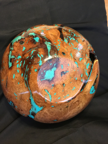 A Mesquite Burl With Turquoise Inlay