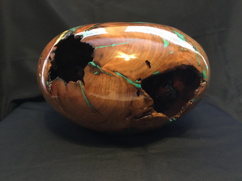 A Mesquite Burl With Turquoise Inlay