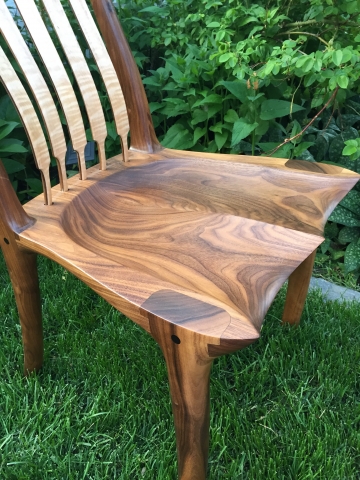Hand sculpted walnut chair