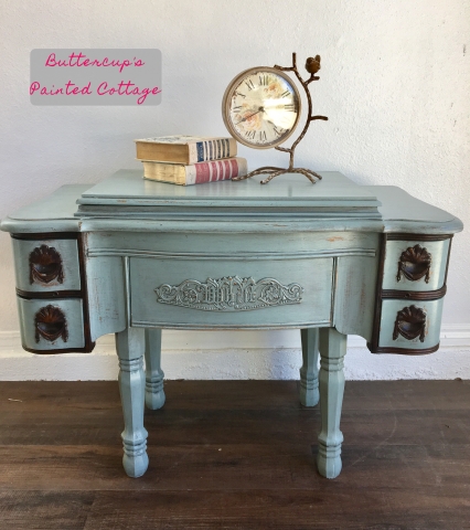 Cute sewing machine cabinet repurposed to coffee table